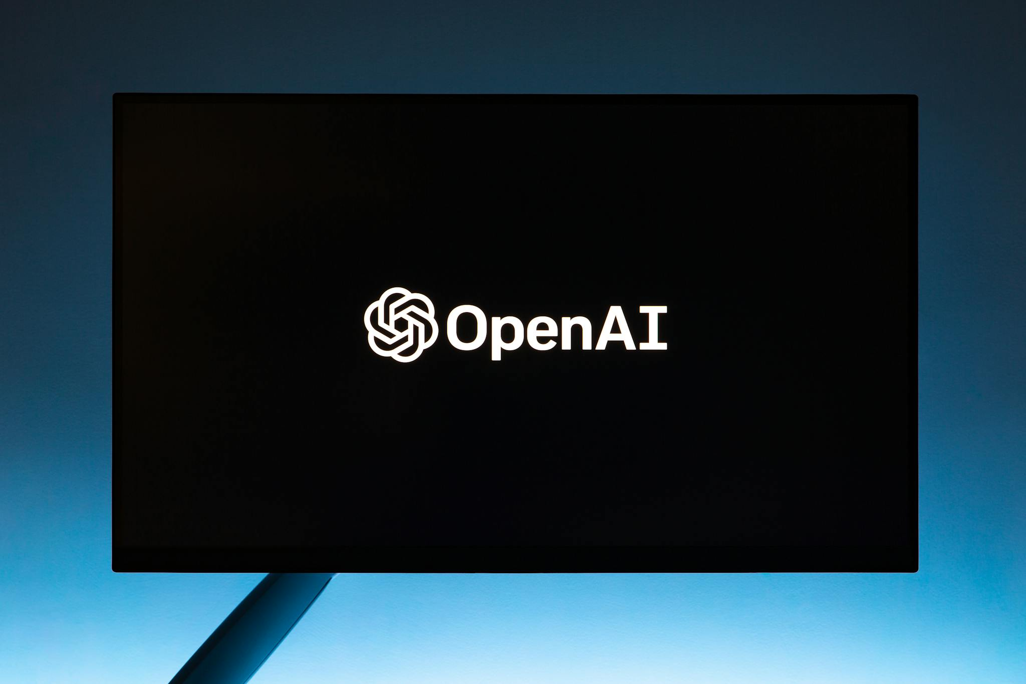Minimalist Display Of Openai Logo On A